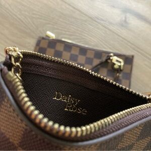 Daisy Rose coin purse and clutch